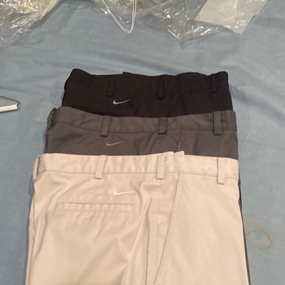 Nike golf dry fit pants in good condition. Black Crème and Steel.